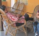 An obese woman relaxing in a chair - Weight loss