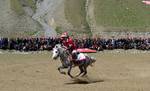 Players and their horses are seen in action during the final match of a Polo tournament at Vishwanathan Stadium in Dras, some 150 kilometers northeast of Srinagar, the summer capital of Kashmir, India, 12 June 2012. Dras is said to be the second coldest place inhabited by man and Polo is the most popular sport in the region, that has an average elevation of about 3,200 meters. The traditional sport is however dying due to lack of opportunity. The 2012 tournament organized by private hotel chain