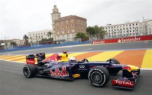 Red Bull driver Sebastian Vettel of Germany steers his car during a test session at Valencia street circuit, Spain