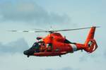 NEW ORLEANS A Coast Guard MH-65C Dolphin helicopter crew from Air Station New Orleans get into position over Lake Pontchartrain during a training evolution, Jan. 17, 2012. The crewmembers train to sharpen the skills and gain experience needed to provide a fast response and efficient resolution to maritime emergencies. U.S. Coast Guard photo by Petty Officer 3rd Class Stephen Lehmann. (1500468) ( Coast Guard units train on Lake Pontchartrain )