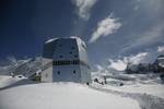 The Monte Rosa Hut in May in front of the Lyskamm. The Monte Rosa Hut (2,883 m) is the only mountain hut in the massif owned by the Swiss Alpine Club.