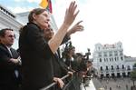 Ecuador's President Rafael Correa, third from left, talks with Christine Assange, the mother of WikiLeaks founder Julian Assange on the balcony of the presidential palace in Quito, Ecuador, Wednesday, Aug. 1, 2012.