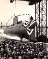 In this file photo taken Jan. 21, 1954, the nuclear-powered submarine USS Nautilus (SSN 571) slips into the Thames River.