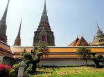 'Welcome to Wat Po' is spelled on the grass of Wat Pho, Bangkok, Thailand