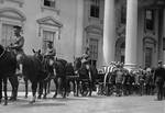 Funeral procession for President Harding passes by the front of the White House. The President's train continued south to San Francisco. Secretary of Commerce Herbert Hoover sent a telegram from Dunsmuir, California, to his friend Dr. Ray L. Wilbur, asking Wilbur to meet and to personally evaluate the President.