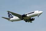 TAROM Boeing 737-300 (YR-BGE) lands at London Heathrow Airport, England.