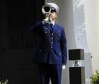 CLEARWATER, Fla. -- Fireman Efrain Rosa, a member of Coast Guard Air Station Clearwaters honor platoon, plays taps during Lt. j.g. Frank Spatuzzis funeral ceremony at St. Cecelia's Catholic Church in Clearwater Fla., Jan. 21, 2012. Spatuzzi died Jan. 13, at Suncoast Hospice House in Brookside, Fla., after his health declined from a fall he suffered Dec. 24, 2011. He was 93. U.S. Coast Guard photo by Petty Officer 3rd Class Michael De Nyse. (1503215) ( )