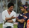 Bollywood actor and Kolkata Knight Riders co-owner Shah Rukh Khan (L) talks with team captain Gautam Gambhir after the IPL Twenty20 cricket match between Kolkata Knight Riders and Pune Warriors India at The Eden Gardens in Kolkata on May 5, 2012