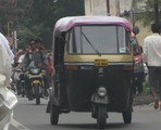 Auto rikshaw on the road in Pune city - public transport vehicle