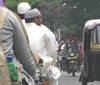 Muslim people on the bike on the city road at the time of Eid, festival of Muslim - India