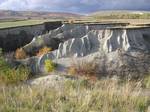 A gully in Saratov Oblast, Russia is a landforms created by running water, eroding sharply into soil, typically on a hillside. Gullies resemble large ditches or small valleys, but are meters to tens of meters in depth and width