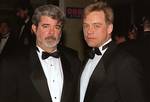 GEORGE LUCAS ,THE FILM´S CREATOR, [LEFT] AND MARK HAMILL WHO PLAYED LUKE SKYWALKER AT THE LONDON PREMIERE OF THE FILM ´STAR WARS´ (AP Photo/Tim Graham Picture Library)