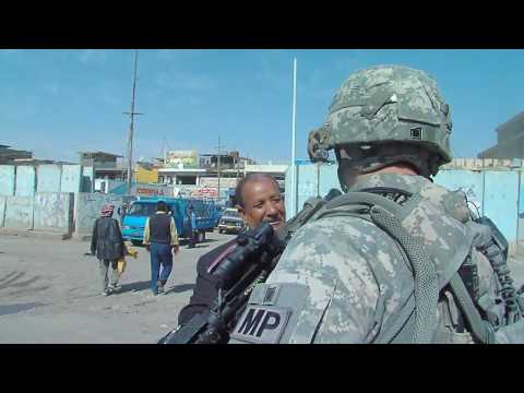 Louisiana Army National Guard Patrols Along The Wall at Sadr City in Baghdad, IRAQ