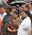 West Bengal Chief Minister Mamata Banerjee hold the Rope including devotees from the International Society for Krishna Consciousness (ISKCON), participate in the Sri Krishna Rath Yatra in Kolkata on June 21, 2012. According to mythology, the Rath Yatra dates back some 5,000 years when Hindu God Krishna along with his older brother Balaram and sister Subhadra were pulled on a chariot from Kurukshetra to Vrindavana by Krishna's devotees