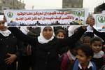 Palestinian girls schools students gather as they protest in the Rafah, southern Gaza Strip on March 03, 2012, Five days following violence in the flashpoint Al-Aqsa mosque compound in Jerusalem's Old City, between Israeli forces and Palestinians. The unrest is believed to have been fuelled by web postings by Israeli rightists urging Jews to visit the mosque compound and assert Israeli sovereignty over the site, one of the most sensitive in the Middle East. Know to Muslims as Al-Haram Al-Sharif