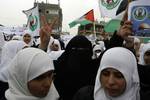 Palestinian girls schools students gather as they protest in the Rafah, southern Gaza Strip on March 03, 2012, Five days following violence in the flashpoint Al-Aqsa mosque compound in Jerusalem's Old City, between Israeli forces and Palestinians. The unrest is believed to have been fuelled by web postings by Israeli rightists urging Jews to visit the mosque compound and assert Israeli sovereignty over the site, one of the most sensitive in the Middle East. Know to Muslims as Al-Haram Al-Sharif