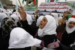 Palestinian girls schools students gather as they protest in the Rafah, southern Gaza Strip on March 03, 2012, Five days following violence in the flashpoint Al-Aqsa mosque compound in Jerusalem's Old City, between Israeli forces and Palestinians. The unrest is believed to have been fuelled by web postings by Israeli rightists urging Jews to visit the mosque compound and assert Israeli sovereignty over the site, one of the most sensitive in the Middle East. Know to Muslims as Al-Haram Al-Sharif