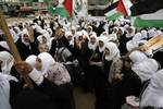 Palestinian girls schools students gather as they protest in the Rafah, southern Gaza Strip on March 03, 2012, Five days following violence in the flashpoint Al-Aqsa mosque compound in Jerusalem's Old City, between Israeli forces and Palestinians. The unrest is believed to have been fuelled by web postings by Israeli rightists urging Jews to visit the mosque compound and assert Israeli sovereignty over the site, one of the most sensitive in the Middle East. Know to Muslims as Al-Haram Al-Sharif