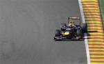 Red Bull driver Mark Webber of Australia steers his car during the third free practice session ahead the Belgium Formula One Grand Prix in Spa-Francorchamps circuit, Belgium