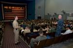 Vice Chief of Naval Operations (VCNO) Adm. Jonothan W. Greenert answers questions during an all-hands call in the Wings Auditorium at Naval Air Station Corpus Christi.