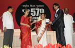 The President, Smt. Pratibha Devisingh Patil presenting the Indira Gandhi Award to Shri Sanjay Puran Singh Chauhan for the Best Debut Film of a Director (Film: Lahore), at the 57th National Film Awards function, in New Delhi on October 22, 2010. The Union Minister for Information and Broadcasting, Smt. Ambika Soni and the Ministers of State for Information and Broadcasting, Shri Choudhury Mohan Jatua and Dr. S. Jagathrakshakan are also seen.