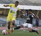 Bhawanipore Footballer José Ramirez Barreto (Yellow and White Jersey ) in action against the Md.Sporting ( Black and White jersey ) during the Kolkata Premier League Division Football Match at Yuba Bharati Krirangan Stadium , Saltlake on Friday 07 September 2012