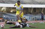 Bhawanipore Footballer José Ramirez Barreto (Yellow and White Jersey ) in action against the Md.Sporting ( Black and White jersey ) during the Kolkata Premier League Division Football Match at Yuba Bharati Krirangan Stadium , Saltlake on Friday 07 September 2012