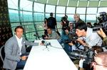 Former Italy and Juventus forward Alessandro Del Piero is surrounded by photographers during a press conference at the Lingotto Palace in Turin, Italy,Wednesday, Sept. 5,2012. Del Piero is joining Sydney FC in a deal that will make him the highest-profile player in the A-League. The two-year deal is reportedly worth $2 million per season, which will make Del Piero the highest paid athlete in Australia's four football codes, including rugby league, rugby union and Australian Rules. The 37-year-ol