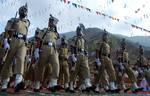 Jammu and Kashmir policemen take part in a passing out parade at a police training centre in Lethpora Awantipora, some 25 kilometers south of Srinagar, Kashmir, India, 20 July, 2012. A total of 937 recruits were formally inducted into the Jammu and Kashmir police after completing nine months of rigorous training in physical fitness, weapon handling, counter insurgency and dealing with the law and order situation, a police official said.