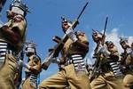 Jammu and Kashmir policemen take part in a passing out parade at a police training centre in Lethpora Awantipora, some 25 kilometers south of Srinagar, Kashmir, India, 20 July, 2012. A total of 937 recruits were formally inducted into the Jammu and Kashmir police after completing nine months of rigorous training in physical fitness, weapon handling, counter insurgency and dealing with the law and order situation, a police official said.