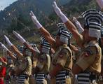 Indian police from the Jammu and Kashmir Armed Police (JKAP) take their oath at a police training centre in Lethpora Awantipora, some 25 kilometers south of Srinagar, Kashmir, India, 20 July, 2012. A total of 937 recruits were formally inducted into the Jammu and Kashmir police after completing nine months of rigorous training in physical fitness, weapon handling, counter insurgency and dealing with the law and order situation, a police official said.