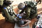 Two IDF Medical Doctors in a training exercise. In 2005, Asa Kasher and Amos Yadlin co-authored a noticed article published in the Journal of Military Ethics under the title: 