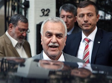 Iraq's Vice President Tariq al-Hashemi speaks to the media as he leaves a meeting with Turkey's Foreign Minister Ahmet Davutoglu, unseen, in Ankara, Turkey, Sunday, Sept. 9, 2012.