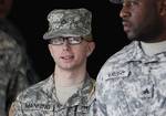 Army Pfc. Bradley Manning, left, is escorted from a courthouse in Fort Meade, Md., Thursday, Dec. 22, 2011, after closing arguments concluded in a military hearing that will determine if he should face court-martial for his alleged role in the WikiLeaks classified leaks case.