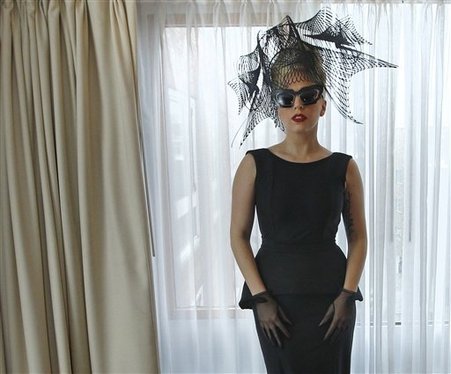 Lady Gaga poses for a portrait in her hotel suite prior to an event at Harvard University in Cambridge, Mass. Wednesday Feb. 29, 2012.