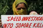 Members of NGO staged a protest against allegedly Human rights Violation in Srinagar 09, August 2011. The NGO Yes Kashmir also demand speedy investigation into the sopore killing and poonch fake encounter.