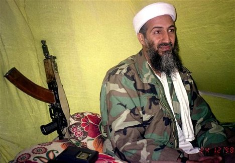 al Qaida leader Osama bin Laden speaks to a selected group of reporters in mountains of Helmand province in southern Afghanistan A person familiar with developments said Sunday, May 1, 2011 that bin Laden is dead and the U.S. has the body.