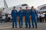 The STS-135 crew in front of Atlantis. The final day began with the wakeup song 