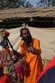 Indian Sadhu, or Hindu holy rest at a temporary camp at Babughat in Kolkata on 05 Jan 2012. Thousands of Hindu pilgrims taka holy dip at Gangasagar, hoping to wash away sins and others to secure a fine spouse, in a sun-worshipping tradition older than Hinduism itself in Eastern India City