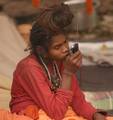 Indian Sadhu, or Hindu holy rest at a temporary camp at Babughat in Kolkata on 05 Jan 2012. Thousands of Hindu pilgrims taka holy dip at Gangasagar, hoping to wash away sins and others to secure a fine spouse, in a sun-worshipping tradition older than Hinduism itself in Eastern India City