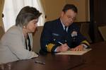 WASHINGTON - Rear Adm. Kevin Cook, Coast Guard Director of Prevention Policy, and Cynthia Giles, Environmental Protection Agency Assistant Administrator, Enforcement and Compliance Assurance, sign a Coast Guard and EPA Vessel General Permit Memorandum of Understanding at EPA Headquarters, Feb. 11, 2011. The Vessel General Permit MOU outlines the cooperative efforts that the Coast Guard and the EPA will undertake to ensure that vessels comply with Vessel General Permit requirements. U.S. Coast Gu