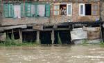 People living along the banks of river Jhelum being shifted to safer places Authorities here on Monday 10, September 2012. Asked people as a flood alarm was sounded in the city due to rising water level in the river following incessant rains River Jhelum is flowing above 16 feet in Ram Munshi Bagh area prompting the flood alarm, officials in the disaster management cell said.