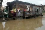 People living along the banks of river Jhelum being shifted to safer places Authorities here on Monday 10, September 2012. Asked people as a flood alarm was sounded in the city due to rising water level in the river following incessant rains River Jhelum is flowing above 16 feet in Ram Munshi Bagh area prompting the flood alarm, officials in the disaster management cell said.