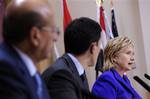 U.S. Secretary of State Hillary Clinton, right, speaks during a press conference with British Foreign Secretary David Miliband, center, and Yemen's foreign minister Abu Bakr al-Qirbi, left, at the Foreign and Commonwealth Office in London, Wednesday, Jan. 27, 2010