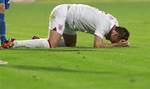 England's John Terry reacts after after an injury in Chisinau, Moldova, Friday, Sept. 7, 2012 during a Group H FIFA World Cup qualifier soccer match against Moldova.