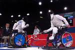 Mario Rodriguez, second from left, a member of the U.S. Paralympic fencing team, battles Russia's Ivan Andreev during a fencing bout during the Paralympic Games at the ExCeL London exhibition and convention center in London Sept. 4, 2012. The Paralympics is a major international sporting event in which thousands of athletes, including wounded and injured U.S. Service members, participate in a variety of sporting events. (U.S. Army photo by Sgt. 1st Class Tyrone C. Marshall Jr./Released)