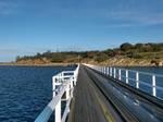 Causeway leading to Granite Island from Victor Harbor. A popular site for visitors is Granite Island, which is connected to the mainland by a short tram/pedestrian causeway.