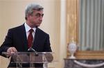 Armenian President Serge Sarkisian, speaks next to his Greek counterpart Karolos Papoulias, unseen, during a news conference and after their meeting, in Athens, on Tuesday, Jan. 18, 2011. Sarkisian is in Greece on a two-days official visit.