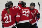 Hayley Wickenheiser celebrates her first CIS goal with her teammates, 8 October 2010