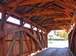 Interior of Saville Covered Bridge on the NRHP since August 25, 1980. On Legislative Route 50037 (Saville Road) in the mini-hamlet of Saville in Saville Township, Perry County, Pennsylvania. Covered Bridge number 38-50-07, built 1903, Burr arch, 60 feet in length. Local unverified source tells me there are 3 steel I beams underneath. Mainly used by farm equipment. Painted bright, bright red on outside.